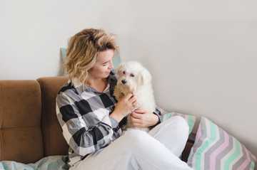 how long can dogs hold their poop